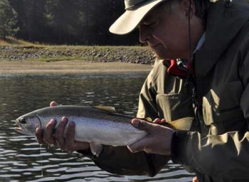 Author Skip Morris 
          with an Upper Columbia River rainbow trout