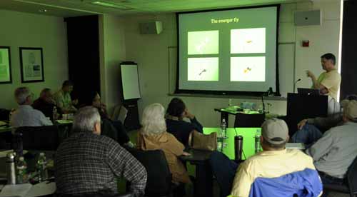 Author and speaker Skip Morris presenting a PowerPoint presentation to a fly fishing club.