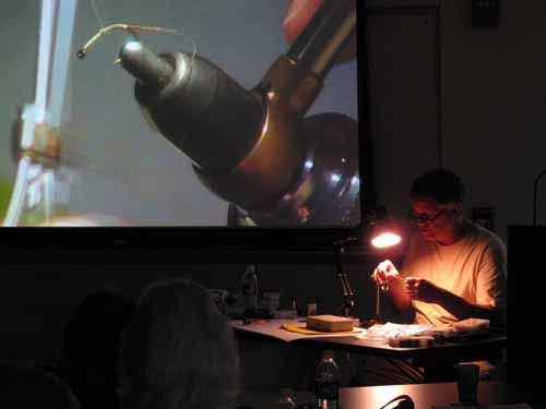 Master fly tier Skip Morris demonstrating fly tying techniques