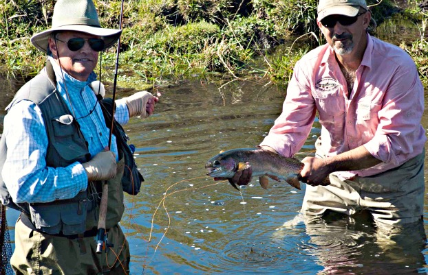 Author Skip Morris and guide GL Britton with the prize; a beautiful Crab Creek rainbow trout